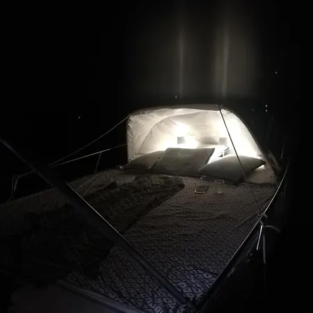 Sleeping On A Boat In The Island's Bay