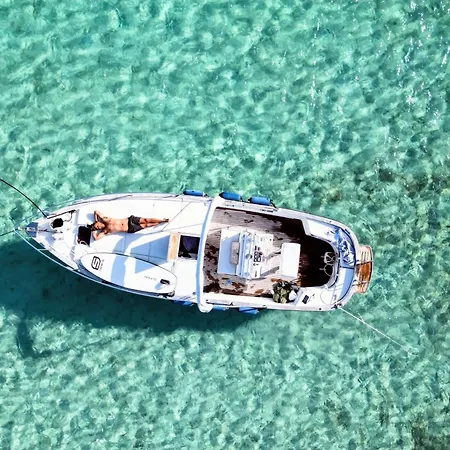 Sleeping On A Boat In The Island's Bay *