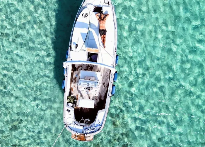 Sleeping On A Boat In The Island's Bay *