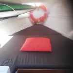 Sleeping On A Boat In The Island's Bay *