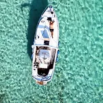 Sleeping On A Boat In The Island's Bay *