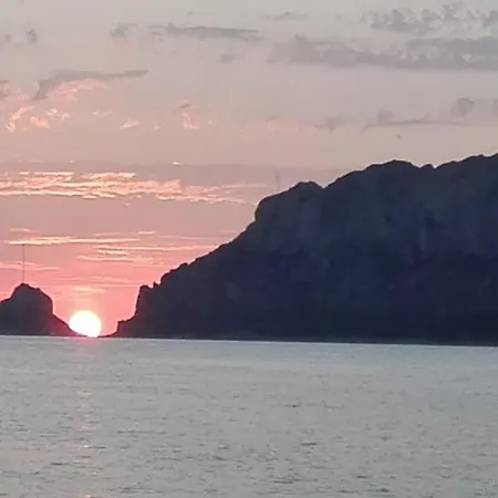 Sleeping On A Boat In The Bay Porto San Paolo (Sardinia)