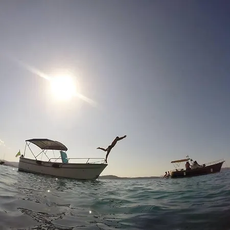 Botel Sleeping On A Boat In The Bay Porto San Paolo (Sardinia)