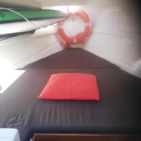 Sleeping On A Boat In The Island's Bay