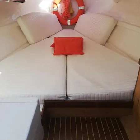 Botel Sleeping On A Boat In The Bay Porto San Paolo (Sardinia)
