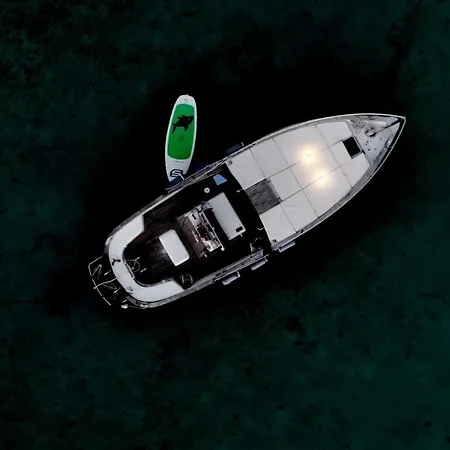 Hotel na wodzie Sleeping On A Boat In The Island's Bay Porto San Paolo (Sardinia)