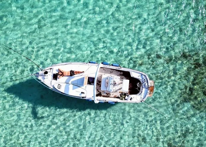 Sleeping On A Boat In The Island's Bay *